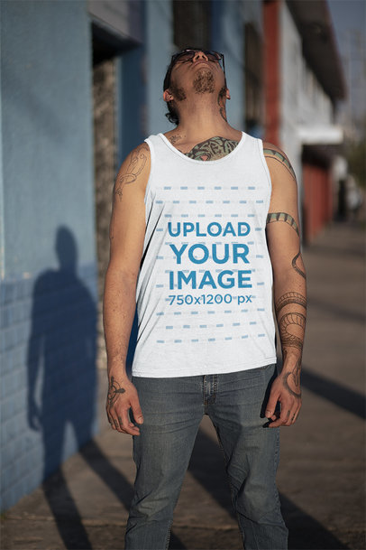 Tank Top Mockup of a Tattooed Man on a Street