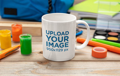 Mockup of an 11 oz Coffee Mug Placed on a Craft Table