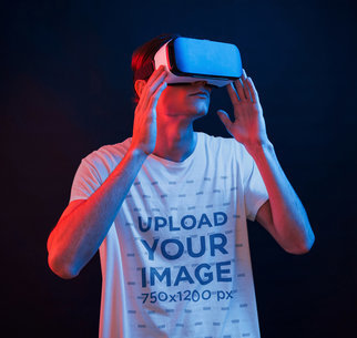 T-Shirt Mockup of a Man Immerse in a VR Game m1441-r-el2