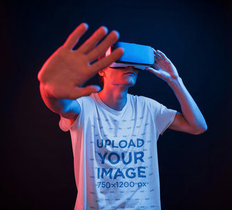 T-Shirt Mockup of a Young Man Using a VR Headset m1911-r-el2