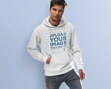 Studio Mockup Featuring a Young Man Wearing a Hoodie