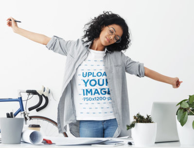 T-Shirt Mockup of a Tired Woman Working from Home