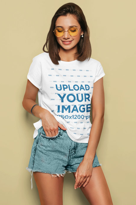T-Shirt Mockup of a Young Woman in a Summer Outfit Posing 