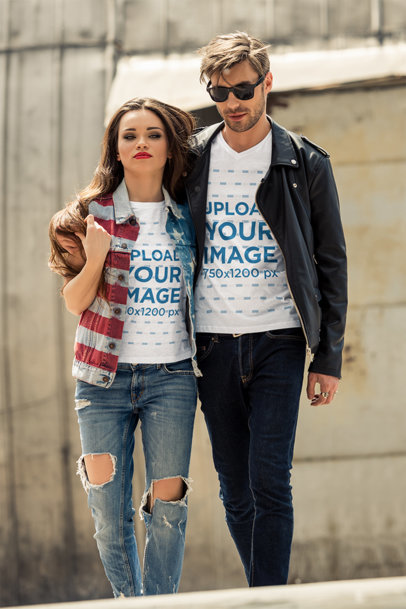 T-Shirt Mockup Featuring a Biker Couple Walking