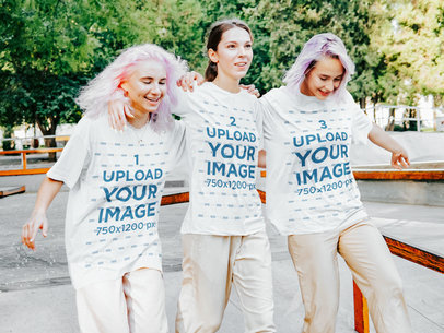 T-Shirt Mockup of Three Teenage Girls at a Skatepark