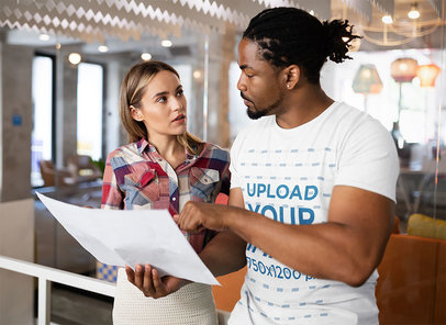 T-Shirt Mockup of a Man Checking a Design at Work 42601-r-el2