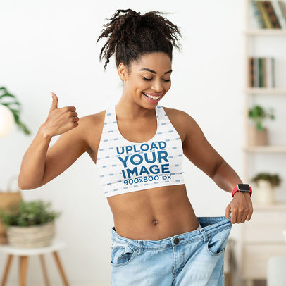 Sports Bra Mockup of a Happy Woman Wearing a Pair of Old Jeans 