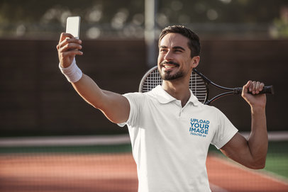 Polo Shirt Mockup of a Happy Tennis Player Taking a Selfie