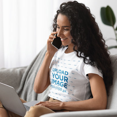 T-Shirt Mockup of a Happy Woman Working from Home