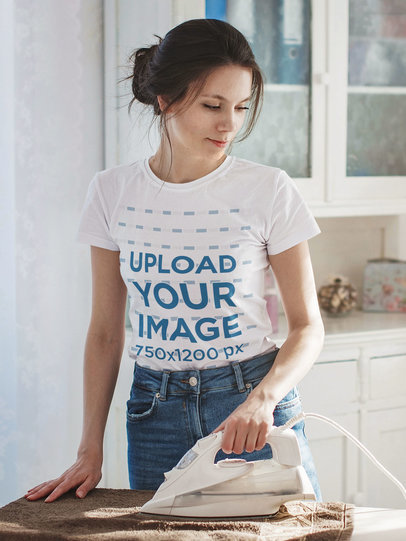 T-Shirt Mockup Featuring a Woman Ironing at Home m2260-r-el2