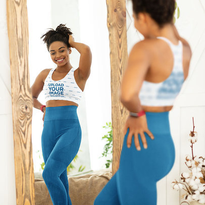 Sports Bra Mockup of a Happy Woman Admiring Her Own Body on the Mirror