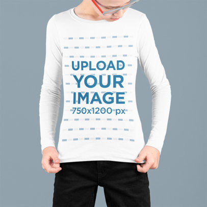  Mockup of a Kid Looking At His Long Sleeve Tee at a Studio 