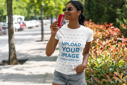 Basic T-Shirt Mockup of a Woman Drinking a Soda