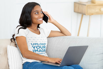 T-Shirt Mockup of a Woman Calmly Working at Home