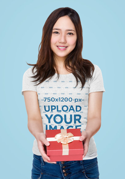 Heathered Tee Mockup of a Woman Holding a Gift
