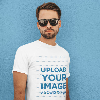 Basic T-Shirt Mockup of a Serious Man With Sunglasses Against a Colored Wall m1533-r-el2