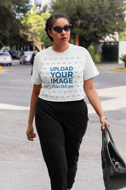 Crop Top Mockup of a Woman With an Athleisure Look Walking Down the Street 