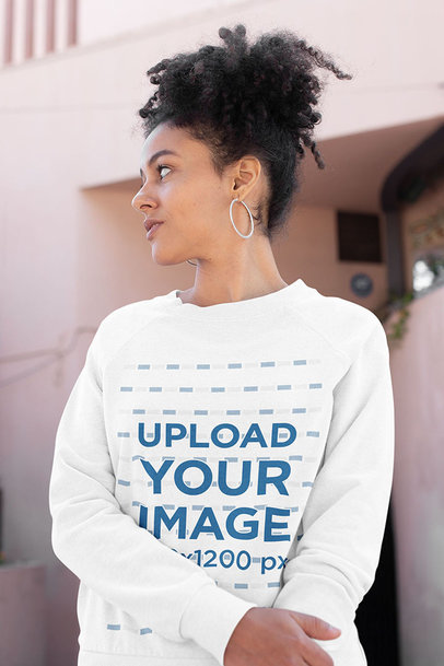 Sweatshirt Mockup Featuring a Curly-Haired Woman Casually Posing