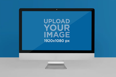Mockup of an iMac Placed on a Customizable Setting