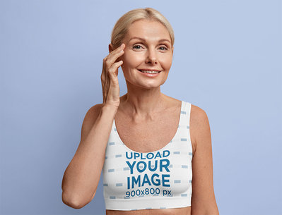 Sports Bra Mockup of a Middle-Aged Woman in a Studio