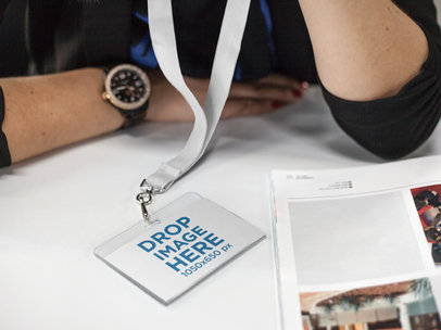 Bored Woman Wearing a Badge Holder Mockup While at the Office