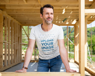 T-Shirt Mockup of a Man at a House Construction Site 