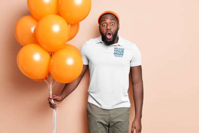 Polo Shirt Mockup of a Surprised Man Holding Some Balloons