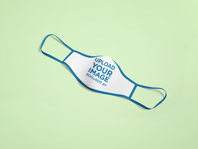Mockup of a Customizable Face Mask Placed on a Flat Surface