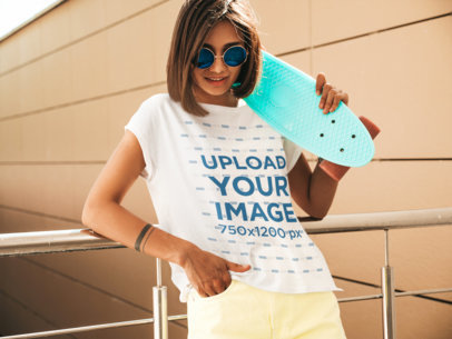Mockup of a Young Woman With Sunglasses Wearing a Customizable T-Shirt 