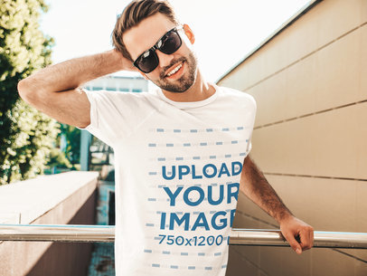 Mockup Featuring a Happy Man With Sunglasses Wearing a T-Shirt 
