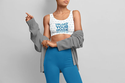 Sports Bra Mockup of a Serious Woman Standing in a Studio