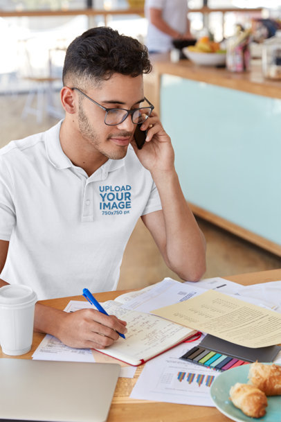 Polo Shirt Mockup of a Man Working at a Cafe
