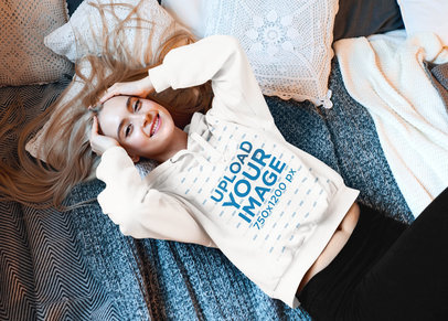 Hoodie Mockup Featuring a Young Long-Haired Woman Lying Down 46842-r-el2