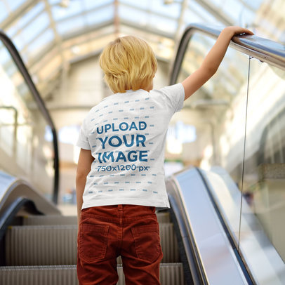 Back View Mockup of a Kid on an Escalator m2441-r-el2