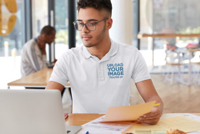 Polo Shirt Mockup of a Man Working at a Public Space