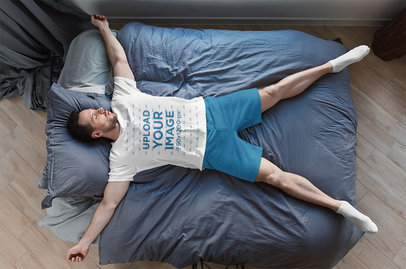 T-Shirt Mockup of a Man Sleeping on an Air Mattress