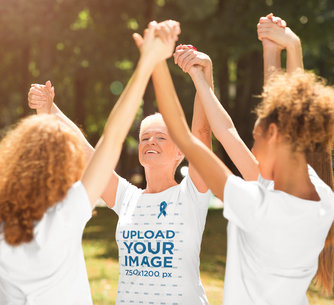 Mockup of a Happy Senior Woman Wearing a T-Shirt With a Ribbon 