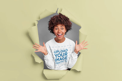 Crewneck Sweatshirt Mockup Featuring a Happy Woman Through a Hole in the Wall