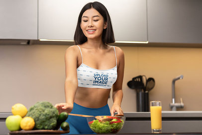 Sports Bra Mockup Featuring a Woman Preparing a Fit Meal