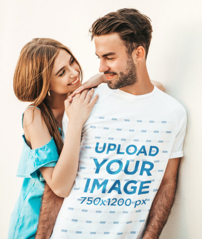 T-Shirt Mockup of a Bearded Young Man Receiving a Hug From His Girlfriend
