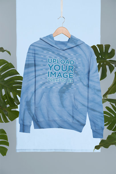 Mockup of a Hoodie with Tie-Dye Texture Placed on a Hanger m4124