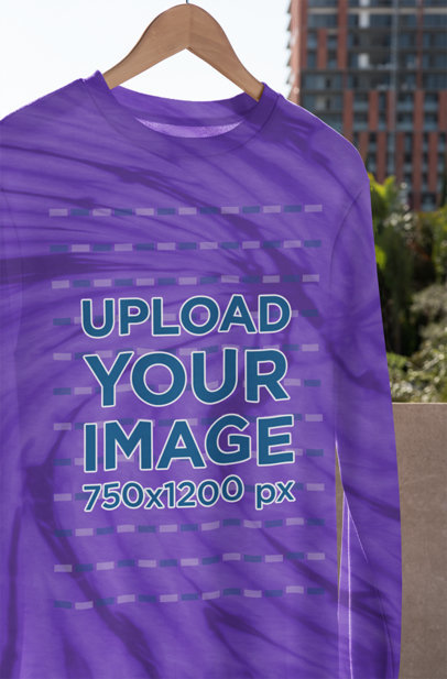 Mockup Featuring a Tie-Dye Sweatshirt on a Wooden Hanger m4127