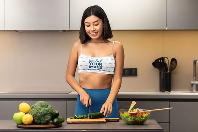 Sports Bra Mockup of a Woman Preparing a Healthy Meal 