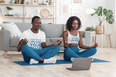 T-Shirt and Sports Bra Mockup of a Couple Doing Yoga at Home