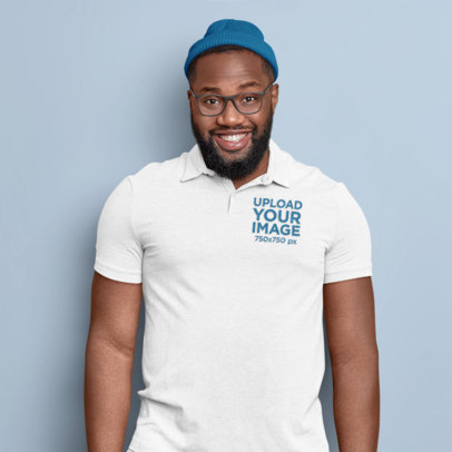 Polo Shirt Mockup of a Bearded Man Standing Against a Wall