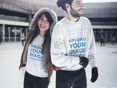 Young Couple Having Fun While at the Ice Skating Park Wearing Crewneck Sweatshirts Mockup a15805