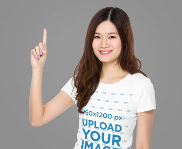 Round-Neck Tee Mockup of a Woman Pointing Up with Her Finger
