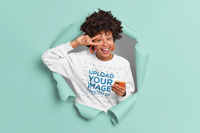 Sweatshirt Mockup of a Woman Making a Peace Sign