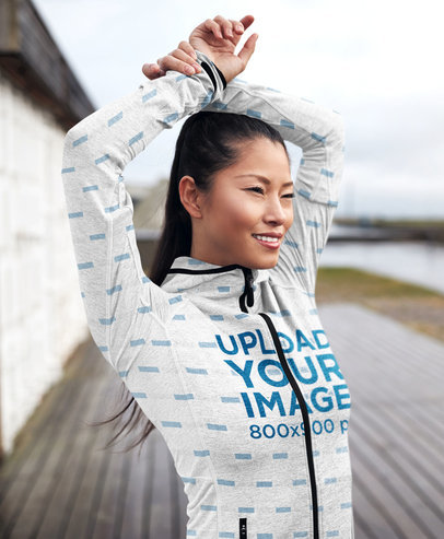Heather Full-Zip Hoodie Mockup Featuring a Young Woman 