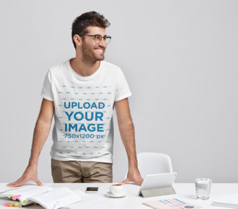 Studio Mockup of a Man Wearing a T-Shirt at a Work Meeting